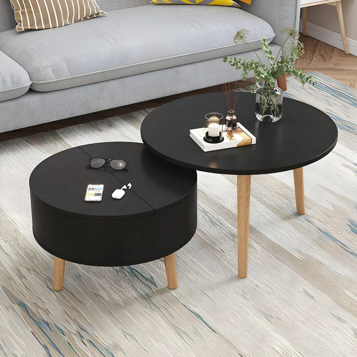 Moderner runder Couchtisch aus Holz in Schwarz und Weiß mit Stauraum