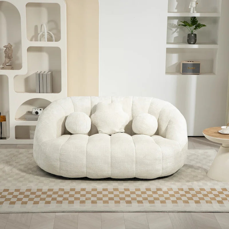 Fauteuil lounge blanc de 63.78, rembourré de chenille et doté de mousse haute densité