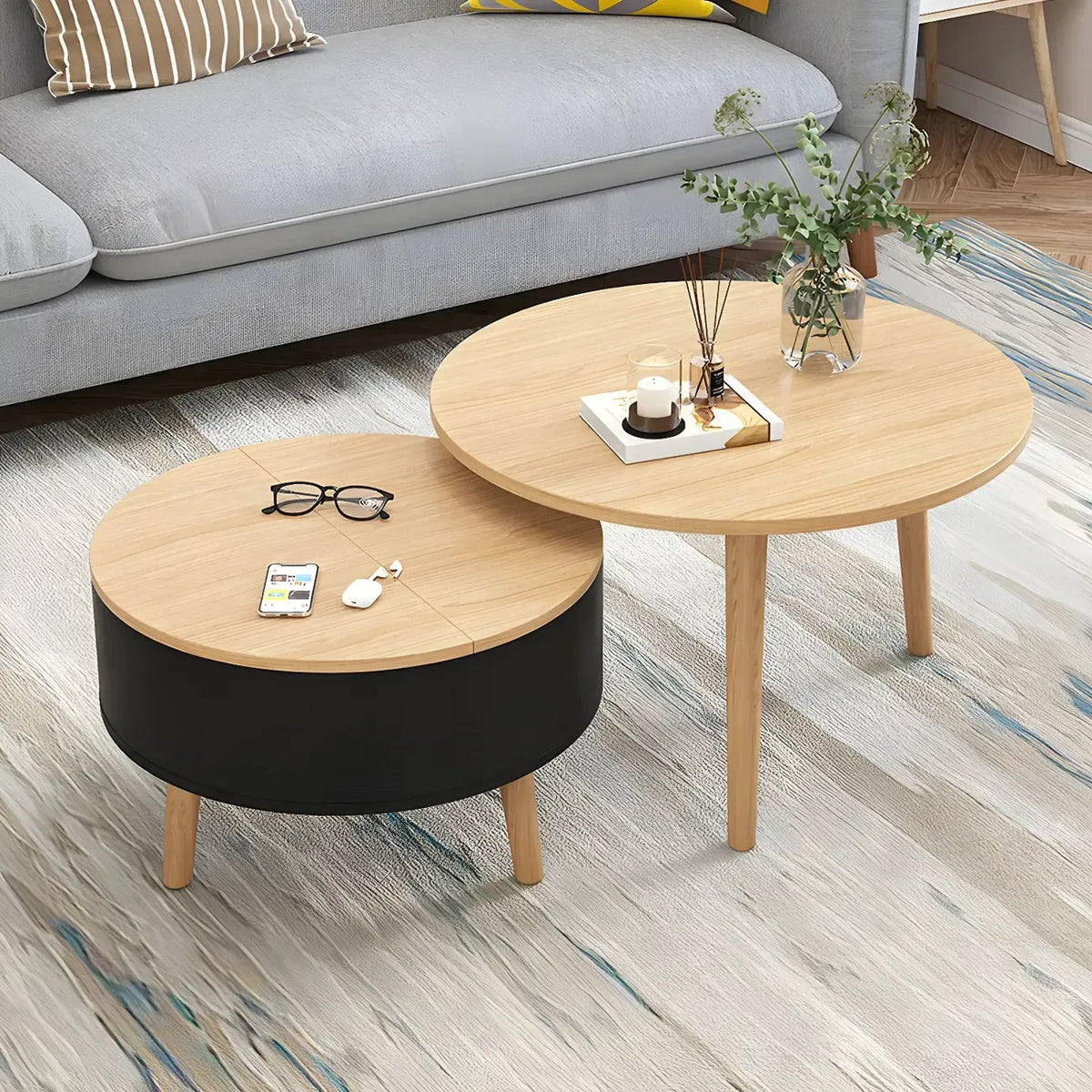 Moderner runder Couchtisch aus Holz in Schwarz und Weiß mit Stauraum
