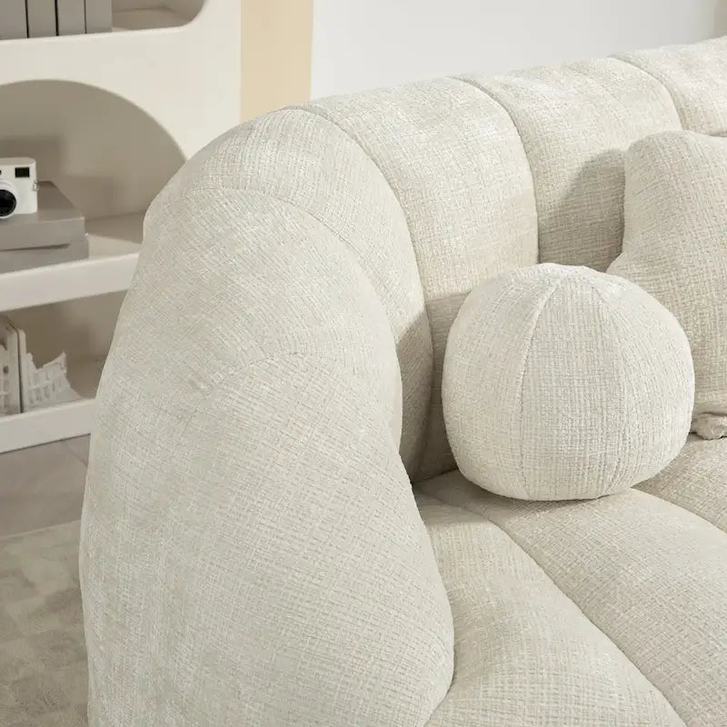 Fauteuil lounge blanc de 63.78, rembourré de chenille et doté de mousse haute densité