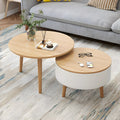 Moderner runder Couchtisch aus Holz in Schwarz und Weiß mit Stauraum