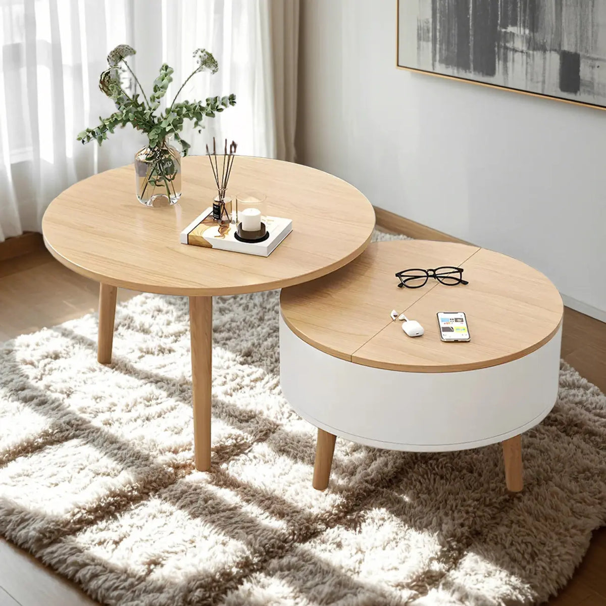 Moderner runder Couchtisch aus Holz in Schwarz und Weiß mit Stauraum