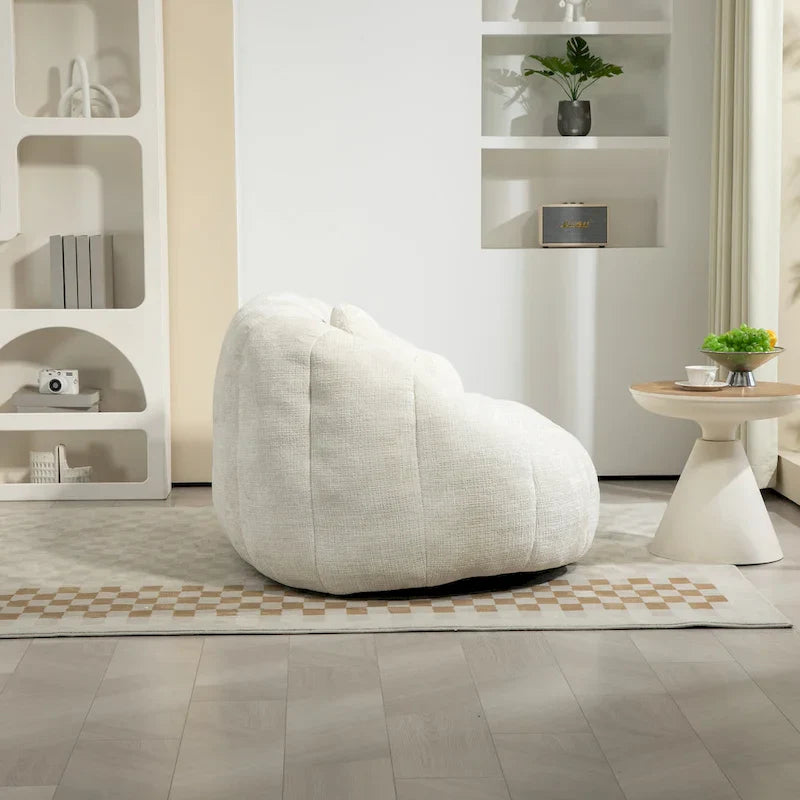 Fauteuil lounge blanc de 63.78, rembourré de chenille et doté de mousse haute densité
