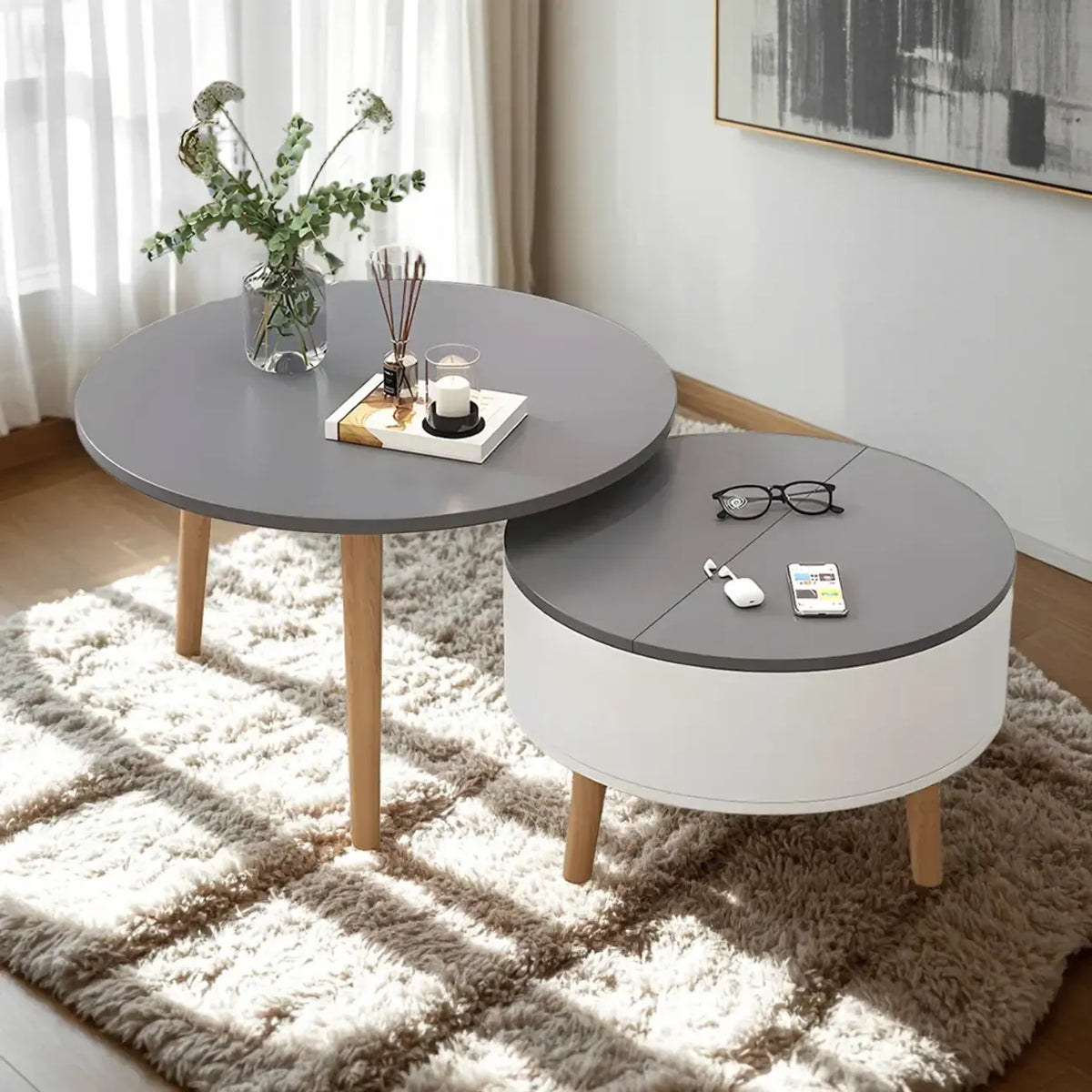 Moderner runder Couchtisch aus Holz in Schwarz und Weiß mit Stauraum