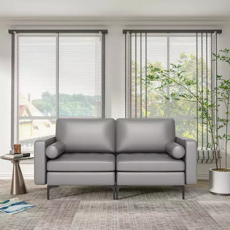 Canapé moderne 2 places avec 2 traversins et poche de rangement latérale, gris