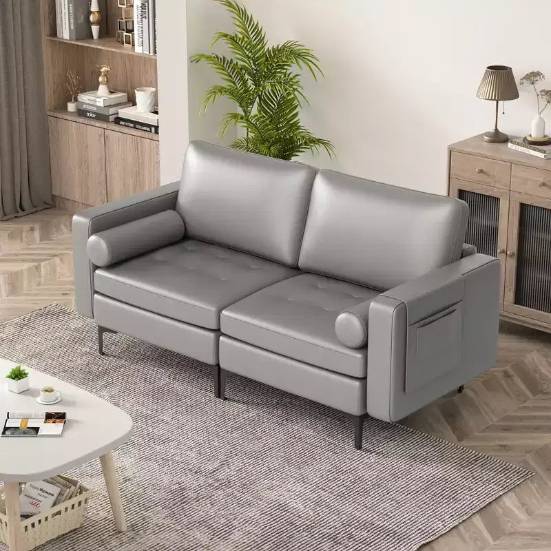 Canapé moderne 2 places avec 2 traversins et poche de rangement latérale, gris