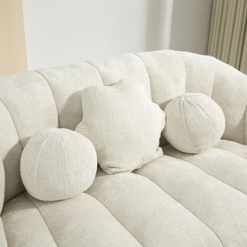 Fauteuil lounge blanc de 63.78, rembourré de chenille et doté de mousse haute densité