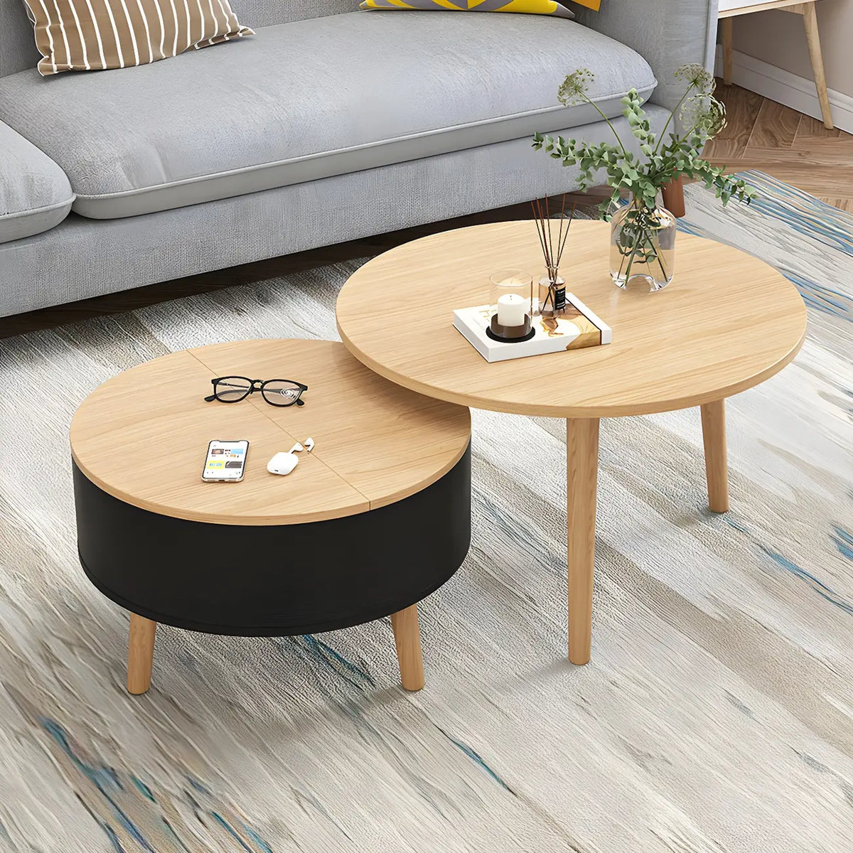Moderner runder Couchtisch aus Holz in Schwarz und Weiß mit Stauraum