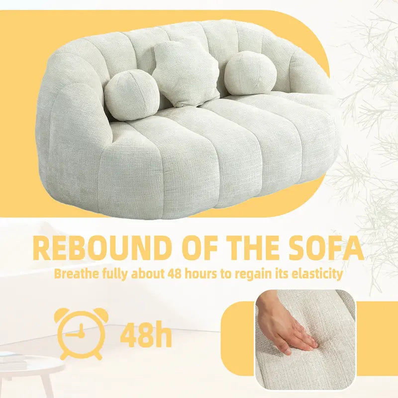 Fauteuil lounge blanc de 63.78, rembourré de chenille et doté de mousse haute densité