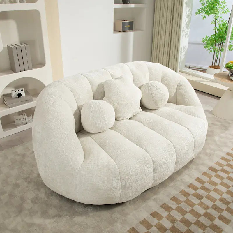 Fauteuil lounge blanc de 63.78, rembourré de chenille et doté de mousse haute densité