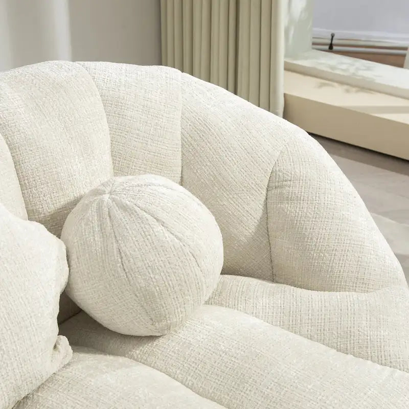 Fauteuil lounge blanc de 63.78, rembourré de chenille et doté de mousse haute densité