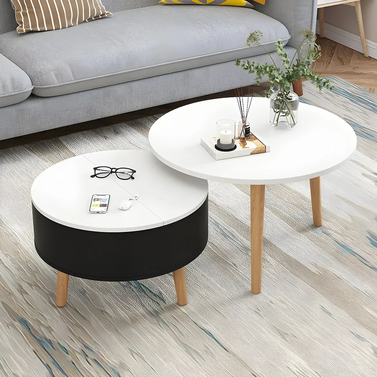 Moderner runder Couchtisch aus Holz in Schwarz und Weiß mit Stauraum