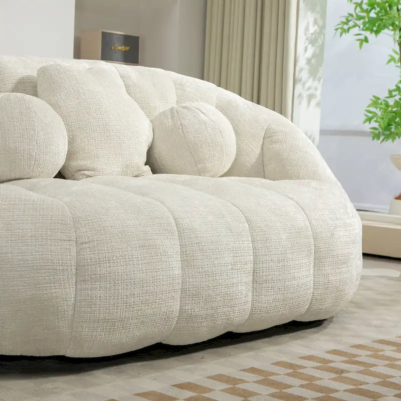 Fauteuil lounge blanc de 63.78, rembourré de chenille et doté de mousse haute densité