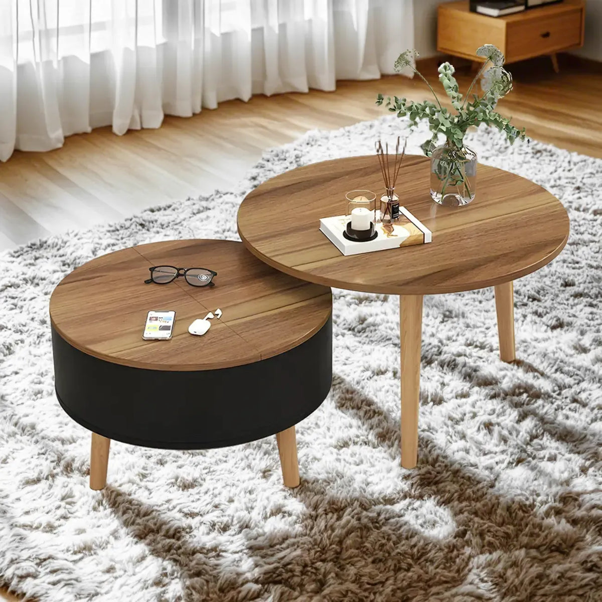 Moderner runder Couchtisch aus Holz in Schwarz und Weiß mit Stauraum
